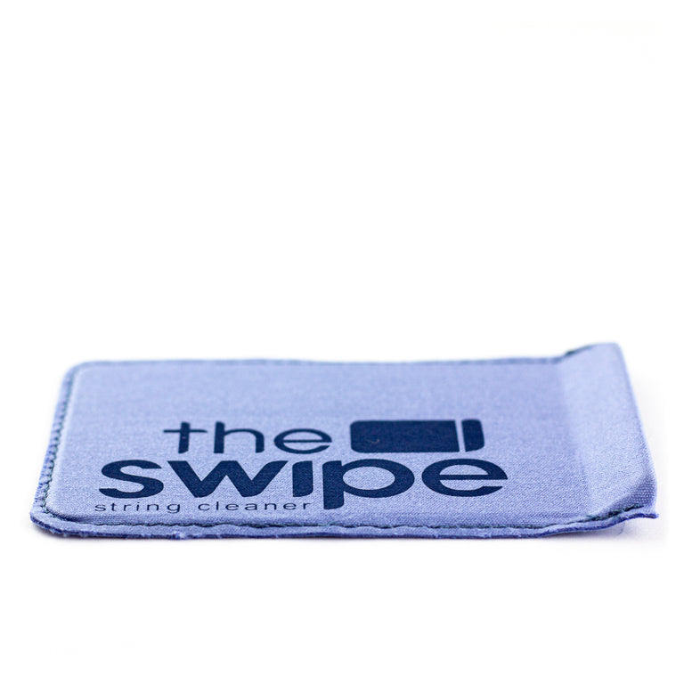 The Swipe Guitar String Cleaning Tool And Cloth