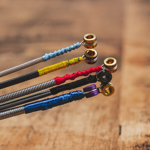 Why do we have silk on our strings?