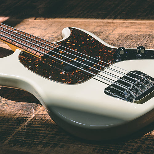 Long Scale Strings on a Short Scale Bass